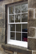 Lewis Decorating — Exterior sash and case window (Inverleith) — Window has been prepared and finished in high quality exterior gloss paint, the mastic was replaced providing the seal between the stonework and the window.